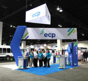 ECP 20x20 booth featuring a modern design with displays and seating for engaging presentations and interactions.