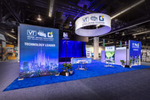 Custom trade show booth for Virginia Transformer with graphics, holograms and a water feature at IEEE 2024.
