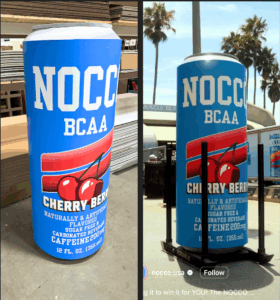 Custom NOCCO cans used for an event activation on a push sled.