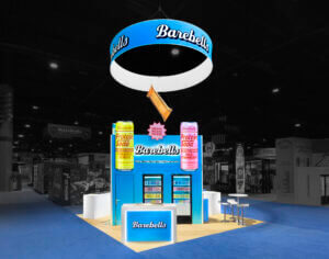Custom 20x20 trade show booth for Barebells featuring protein bars and soda and NOCCO energy drinks, designed for product promotion.