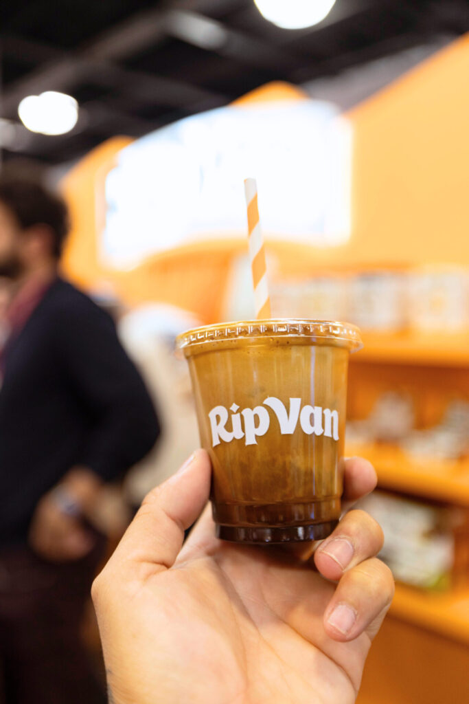 Rip Van Expo West booth with coffee bar and branded bags