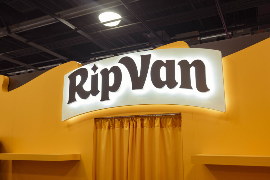 Custom Rip Van logo sign and product shelves at Expo West