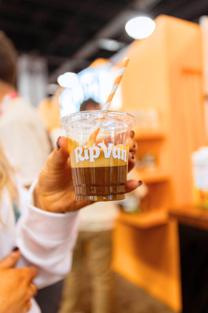 Rip Van Expo West booth with coffee bar and branded bags