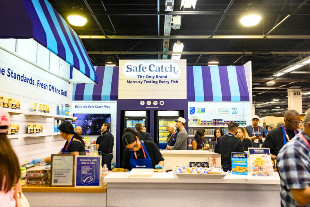 Custom awnings and branding at Safe Catch exhibit booth